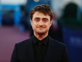 Daniel Radcliffe reacts as he poses on the red carpet on September 9, 2016 in the northwestern sea resort of Deauville, as part of the 42nd Deauville US Film Festival.