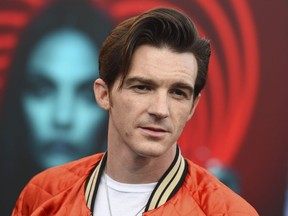 FILE - Drake Bell appears at the world premiere of "The Spy Who Dumped Me" in Los Angeles on July 25, 2018.