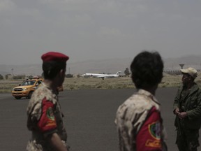 International Red Cross plane carrying prisoners takes off in Sanaa, Yemen, Friday, Apr. 14, 2023. An exchange of more than 800 prisoners linked to Yemen's long-running war them began Friday, the International Committee for the Red Cross said. The three-day operations will see flights transport prisoners between Saudi Arabia and Yemen's capital, Sanaa, long held by the Iranian-backed Houthi rebels.