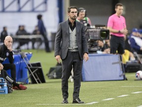 CF Montreal's head coach Hernan Losada looks on from the sideline during second half MLS soccer action against the Philadelphia Union in Montreal, Saturday, March 18, 2023.