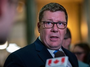 Saskatchewan Premier Scott Moe speaks to the media after the Saskatchewan budget is presented in Regina, on Wednesday, March 22, 2023. Moe says he did not meet with Justin Trudeau because he was only offered five minutes with the prime minister during a Saskatchewan stop last week.