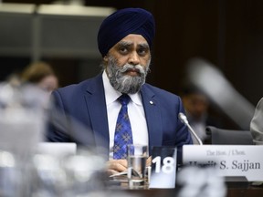Minister of International Development Harjit Sajjan prepares to appear at the Standing Committee on Citizenship and Immigration, studying the government's response to the final report on the Special Committee on Afghanistan, in Ottawa, on Wednesday, April 26, 2023.