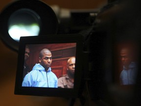 Thabo Bester is seen on a TV camera screen in the Western Cape High Court, in Cape Town, South Africa Thursday, May 3, 2012, where he appeared in connection with murder. The South African convicted murderer who faked his death to escape from prison has been arrested in Tanzania following a two-week manhunt, police have announced. South African officials are going to Tanzania Sunday April 9, 2023, to begin to extradite Thabo Bester.