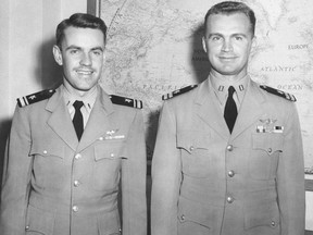 FILE - This July 15, 1955, photo shows plane commander Lt. R.H. Fischer, right, and co-pilot Lt. J/G D.M. Lockhart, in Kodiak, Alaska, after their Navy Neptune plane was shot down over the Bering Strait by Russian MiGs, June 22, 1955. Several crew members were injured but all 11 survived the crash landing on Alaska's St. Lawrence Island and were rescued by Siberian Yupik Eskimos living on the island, all of whom happened to be members of the Alaska National Guard.
