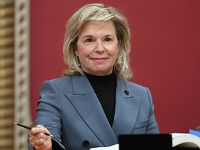 Martine Biron smiles as she is sworn in as Quebec minister of International Relations and for the Francophonie, during a ceremony at the Quebec Legislature, in Quebec City, Oct. 20, 2022.
