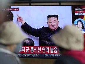 A TV screen is seen reporting North Korea's missile launch with a file image of North Korean leader Kim Jong Un during a news program at the Seoul Railway Station in Seoul, South Korea, Thursday, April 13, 2023. North Korea launched a ballistic missile that landed in the waters between the Korean Peninsula and Japan on Thursday, prompting Japan to order residents on an island to take shelter as a precaution. The order has been lifted.