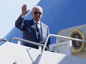 President Joe Biden boards Air Force One, Tuesday, April 11, 2023, at Andrews Air Force Base, Md. Biden is traveling the United Kingdom and Ireland in part to help celebrate the 25th anniversary of the Good Friday Agreement.