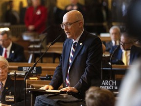 FILE - Nebraska state Sen. John Arch, R-La Vista, speaks before unanimously being voted in as Speaker of the Legislature, Jan. 4, 2023, in Lincoln, Neb. Arch took the extraordinary move of suspending business on the floor for nearly an hour Thursday, April 13, 2023, as lawmakers prepared to vote on a contentious bill to ban gender-affirming care for minors. Arch later announced that conservative lawmakers would work up a compromise with opponents and medical professionals before the bill comes up for passage.