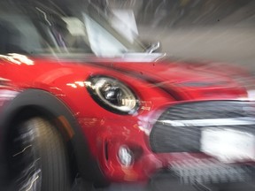 A 2023 Cooper Clubman S sports-utility vehicle is displayed on the showroom floor of a Mini dealer on Thursday, April 20, 2023, in Highlands Ranch, Colo. On Tuesday, the Conference Board reports on U.S. consumer confidence for April.