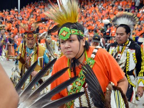 Dancers young and old take part in an Orange Shirt Day Powwow in Winnipeg on September 30, 2022.