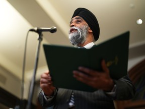 International Development Minister Harjit S. Sajjan speaks at a press conference on Parliament Hill in Ottawa on Monday, March 27, 2023. Sajjan says his government might boost foreign aid if the Canadian economy rebounds, after a drop in development funding that has the sector preparing to cut programs.