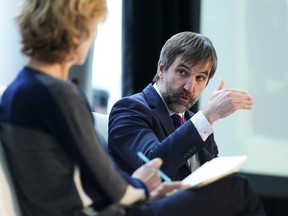 Minister of Environment and Climate Change Steven Guilbeault takes part in a conversation with Diana Fox Carney, Senior Adviser, Eurasia Group and Strategic Advisory Board Member, Terramera, during the Canada 2020 Net-Zero Leadership Summit in Ottawa on Wednesday, April 19, 2023. Guilbeault says a new analysis of the social cost of carbon emissions suggests the economic cost of greenhouse gas emissions is nearly five times higher than previously thought.