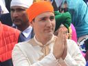 Justin Trudeau pays his respects at the Sikh Golden Temple in Amritsar on February 21, 2018. 
