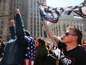 NEW YORK, NY - APRIL 04: Supporters of former President Donald Trump gather outside of the Manhattan Criminal Court before his arraignment on April 04, 2023 in New York City. Trump will be arraigned during his first court appearance today following an indictment by a grand jury that heard evidence about money paid to adult film star Stormy Daniels before the 2016 presidential election. With the indictment, Trump becomes the first former U.S. president in history to be charged with a criminal offence.
