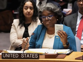 Linda Thomas-Greenfield, United States Ambassador to the United Nations, holds a copy of the United Nations charter as she speaks during a meeting of the U.N. Security Council, Monday, April 24, 2023, at United Nations headquarters.