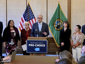 Washington Gov. Jay Inslee speaks during a press conference, Tuesday, April 4, 2023, at the state Capitol in Olympia, Wash. The state of Washington has stockpiled a three-year supply of an abortion pill in anticipation of a court ruling that could limit its availability, Inslee announced Tuesday.