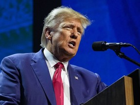 FILE - Former President Donald Trump speaks at the National Rifle Association Convention in Indianapolis, Friday, April 14, 2023. Trump has raised more than $34 million for his 2024 campaign since the start of the year, according to his campaign.
