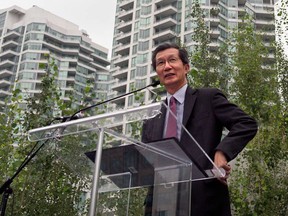 Former Ontario cabinet minister Michael Chan is suing the Canadian Security Intelligence Service and unidentified employees who he says leaked classified information with the intent of harming his reputation. Chan speaks about Toronto Pan Am/Parapan Am Games on August 28, 2013.