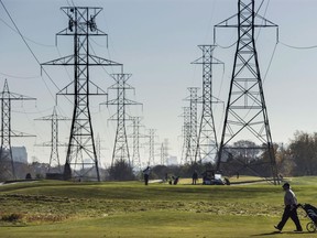 Hydro towers are seen over a golf course in Toronto on Wednesday, November 4, 2015.&ampnbsp;Ontario's electricity system operator is announcing that it is bringing seven new battery storage projects into the province's grid, to support reliability and help eventually move away from natural gas. THE&ampnbsp;CANADIAN PRESS/Darren Calabrese