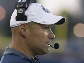 Toronto Argonauts head coach Scott Milanovich watches his team make a play against Hamilton Tiger-Cats during first half CFL football action in Toronto on Thursday June 23, 2016. The 50-year-old native of Butler, Pa., which is located 56 kilometres north of Pittsburgh, is back in the CFL as a senior assistant coach with the Hamilton Tiger-Cats.