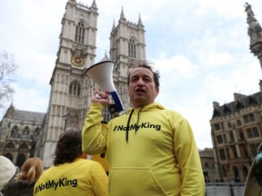 Graham Smith, a member of a Republic and the author of the book 'Abolish the Monarchy', attends a anti-monarchy protest prior to the Commonwealth Service, outside Westminster Abbey in London, Britain, March 13, 2023.