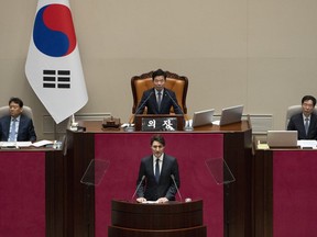 Speaker of the National Assembly Kim Jin-pyo looks on as Prime Minister Justin Trudeau speaks to the National Assembly in Seoul, South Korea, Wednesday, May 17, 2023.
