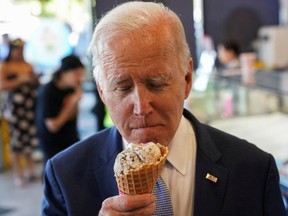 U.S. President Joe Biden eats ice cream in Portland, Oregon.