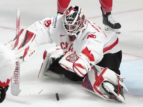 Goalie SamMontembeault of Canada in action during the group B match between Slovakia and Canada at the ice hockey world championship in Riga, Latvia, Monday, May 15, 2023.