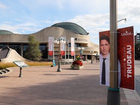 A campaign sign for Liberal leader Justin Trudeau is pictured in front of the Canadian Museum of History, the location of the English-language federal election leaders' debate, in Gatineau, Quebec, September 7, 2021. REUTERS/Patrick Doyle