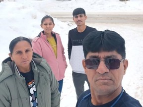 Pravinbhai Chaudhari, 49, is seen in an undated handout photo alongside his family including wife Dakshaben, 45; son Meet, 20; and 23-year-old daughter, Vidhi.