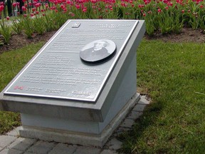 A plaque, that has since been removed, honours Canada's first prime minister John A. Macdonald, in Kingston, Ont.
