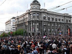 Protesters march during a rally to call for the resignation of top officials and the curtailing of violence in the media, just days after back-to-back shootings stunned Serbia, in Belgrade on May 8, 2023.