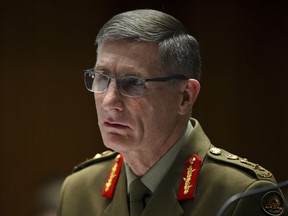 Chief of the Australian Defense Force (ADF) Gen. Angus Campbell speaks during Senate Estimates at Parliament House in Canberra, Tuesday, May 30, 2023. The U.S. government warned that allegations of war crimes against Australian soldiers in Afghanistan could prevent U.S. forces from working with Australia's Special Air Service Regiment, Campbell said on Wednesday.