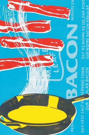 Strips of bacon and cast-iron skillet