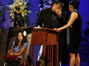 FILE - Reynaldo Gonzalez breaks down while remembering his daughter Nohemi Gonzalez, who was killed in the Paris attacks in November, at her funeral at the Calvary Chapel in Downey, Calif., Dec. 4, 2015. The Supreme Court on Thursday, May 18, 2023, sidestepped a case against Google that might have allowed more lawsuits against social media companies. The justices' decision returns to a lower court the case from the family of Nohemi Gonzalez. The family wants to sue Google for YouTube videos they said helped attract IS recruits and radicalize them. Google owns YouTube.