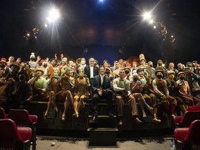 Stephane Lefebvre, centre, CEO of Cirque du Soleil, poses with artists and crew members after the opening night of "KURIOS – Cabinet of Curiosities", Cirque du Soleil's new production in Toronto on April 14, 2022.