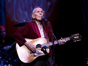 Gordon Lightfoot performs during the first concert at the newly re-opened Massey Hall in Toronto, Thursday, Nov. 25, 2021.&ampnbsp;The City of Orillia says Lightfoot was highly regarded in his hometown and had immense impact in his community and across Canada. THE&ampnbsp;CANADIAN PRESS/Cole Burston