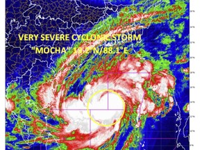 This satellite image provided by India Meteorological Department shows storm Mocha intensify into a very severe cyclonic storm. Authorities in Bangladesh and Myanmar prepared to evacuate hundreds of thousands of people Friday, warning them to stay away from coastal areas as a severe cyclonic storm churned in the Bay of Bengal. The storm is expected to roar in on Sunday with a wind speed of up to 160 kilometers per hour (100 miles per hour), gusting to 175 kph (110 mph) between Cox's Bazar in Bangladesh and Kyaukpyu in Myanmar, India's Meteorological Department said. (India Meteorological Department via AP)