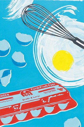 Egg carton, broken egg shells and a cracked egg in a bowl, ready to be whisked