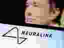 The Neuralink logo and Elon Musk are seen in this illustration.