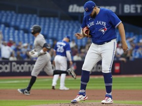 New York Yankees centre fielder Aaron Judge rounds the bases after hitting an opposite field home run as Toronto Blue Jays starting pitcher Alek Manoah reacts during first inning AL MLB action in Toronto on Monday May 15, 2023.