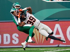 Saskatchewan Roughriders receiver Keith Corbin III (80) attempts to make a catch as BC Lions defensive back Jaylon McClain-Sapp (39) defends during the first half of pre-season CFL football action in Regina, on Saturday, May 27, 2023.