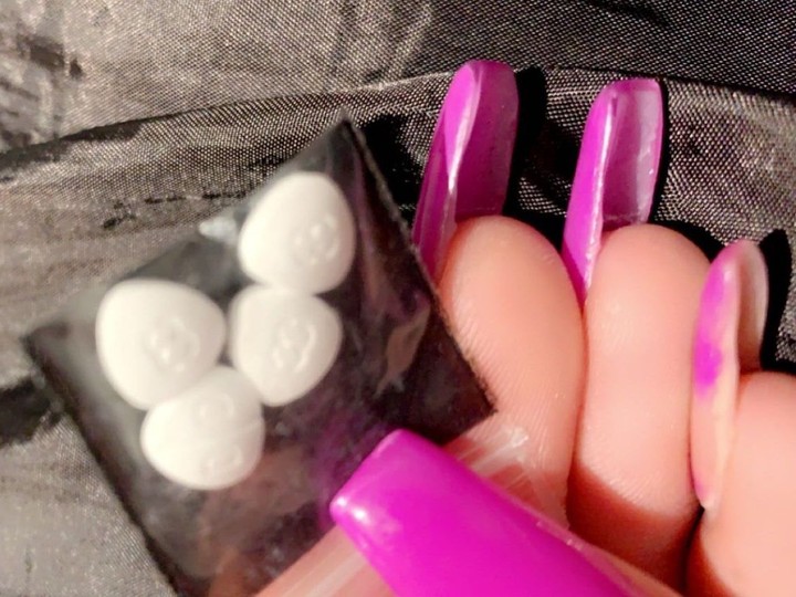  A photo Kamilah Sword took of herself holding hydromorphone tablets. Kamilah died from an overdose. Hydromorphone, a drug commonly used in safer supply programs, was found in her system.