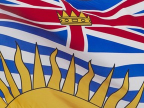 British Columbia's provincial flag flies in Ottawa, Friday, July 3, 2020. The principal of a high school in Saanich, B.C., on Vancouver Island says parents should be on alert over an increase in violent crime and gang activity involving young people in the community.