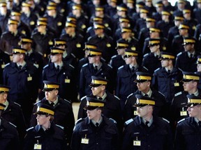 RCMP cadets attend daily marches at the Drill Hall at the RCMP headquarters in Regina, Sask. on Friday, March 3, 2005.