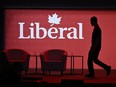 A stagehand works on the stage in between presenters at the 2023 Liberal National Convention in Ottawa on Thursday, May 4, 2023.