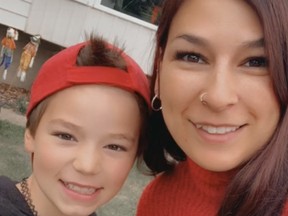 Carolann Robillard, 35, and her child Sara Miller, 11, who had started using the first name Jayden, pose in this undated handout photo. Both were killed in a May 5 random attack outside an Edmonton school.