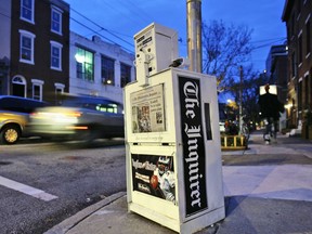 FILE - A Philadelphia Inquirer newspaper vending machine stands in Philadelphia on Nov. 30, 2006. The Philadelphia Inquirer experienced the most significant disruption to its operations in 27 years due to what the newspaper calls a cyberattack on Sunday, May 14, 2023. The company was working to restore print operations after a cyber incursion that prevented the printing of the newspaper's Sunday print edition, the Inquirer reported on its website.