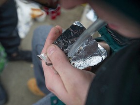 A drug user with fentanyl at a Vancouver park.