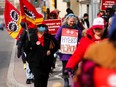 PSAC workers and supporters picketed in front of Treasury Board President Mona Fortier's office in Ottawa on April 21.